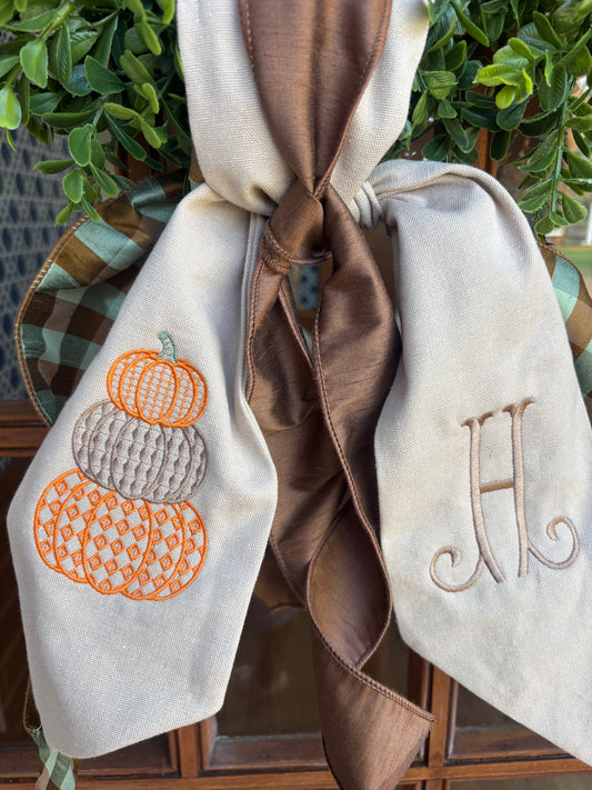 Personalized fall pumpkin wreath sash with embroidered pumpkins, brown ribbon and green gingham ribbon